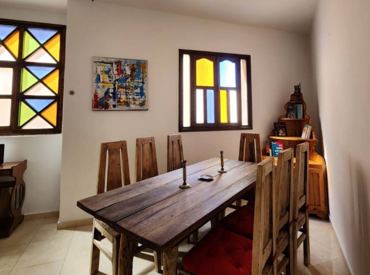 Inviting living area with plush seating in a Kridari rental home.