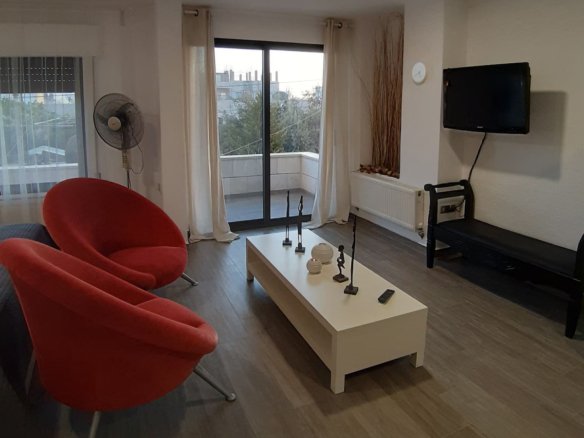 Modern Kridari rental living area.