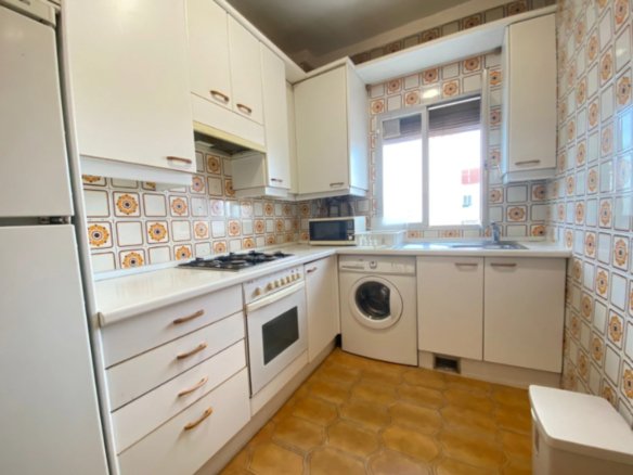 Cozy Kridari rental kitchen area.
