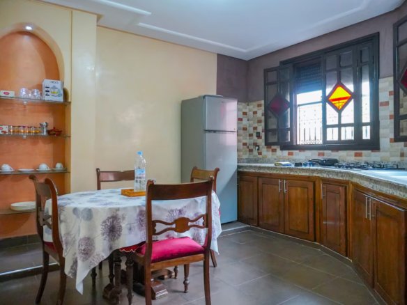 Fully equipped kitchen in a Kridari apartment for comfortable living.