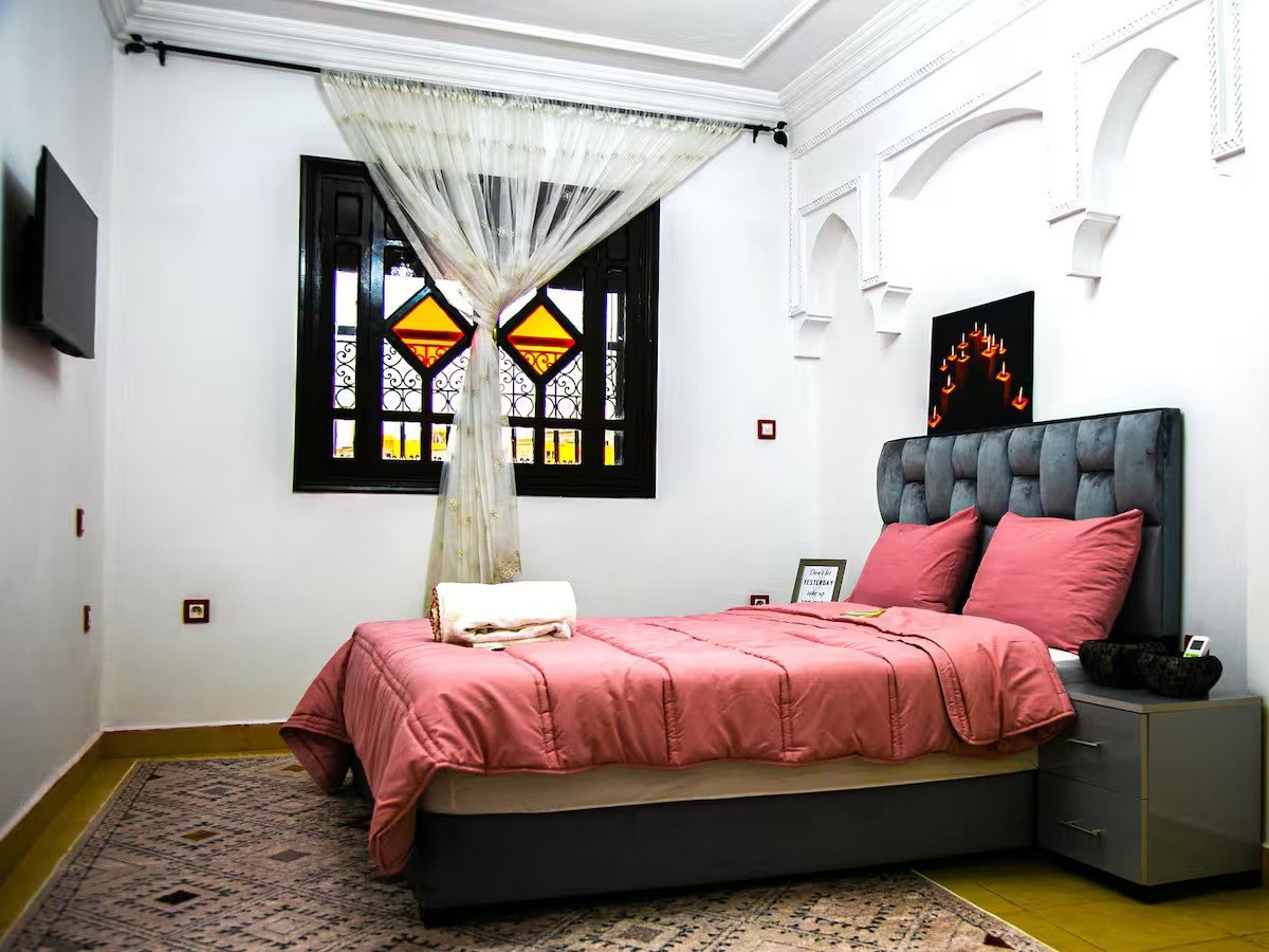Peaceful bedroom with a king-sized bed in a Kridari rental.