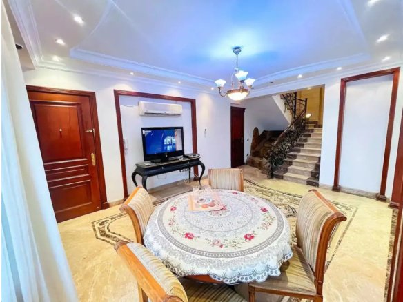 Inviting living area with plush seating in a Kridari rental home.