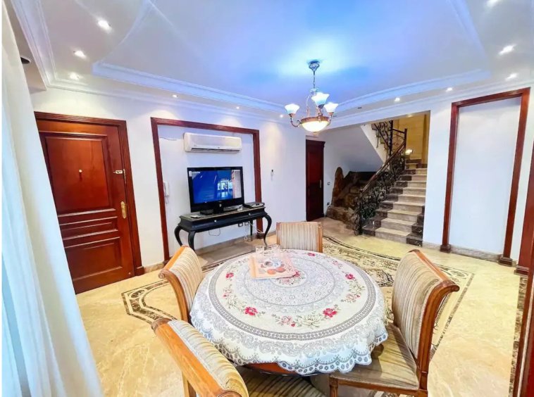 Inviting living area with plush seating in a Kridari rental home.
