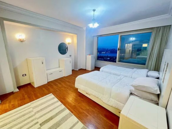 Relaxing bedroom with plush bedding in a Kridari rental home.