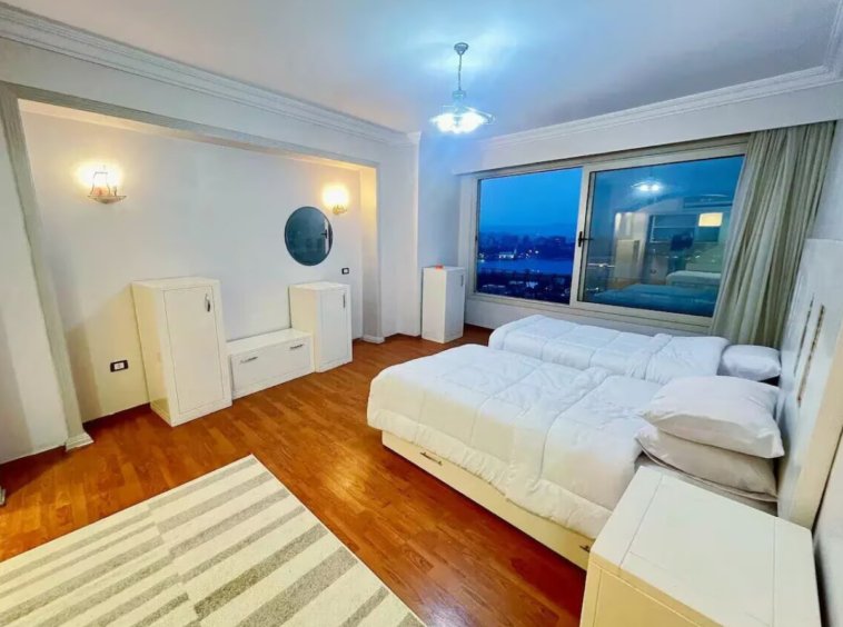 Relaxing bedroom with plush bedding in a Kridari rental home.
