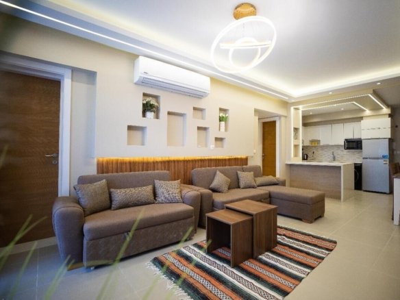 Minimalist living space in a Kridari rental with neutral tones and natural light.