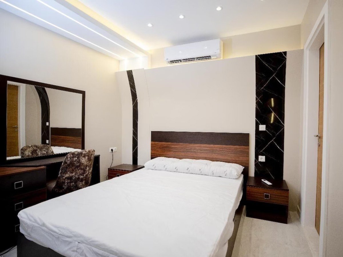 Relaxing bedroom with plush bedding in a Kridari rental home.